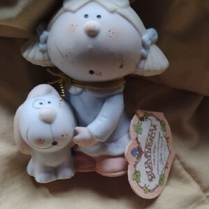 Boots Cherub Figurine with Gold Accents